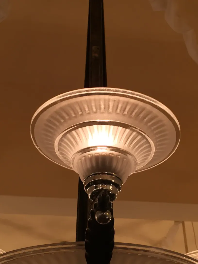 antique hanging lamp with details on the top