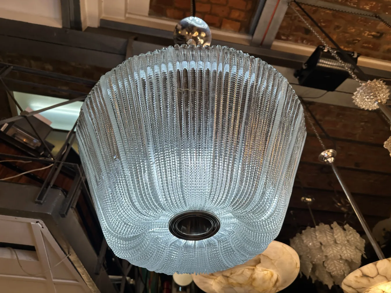 Antique hanging lamp by Paolo Venini, elegant design, bright light, warm environment.