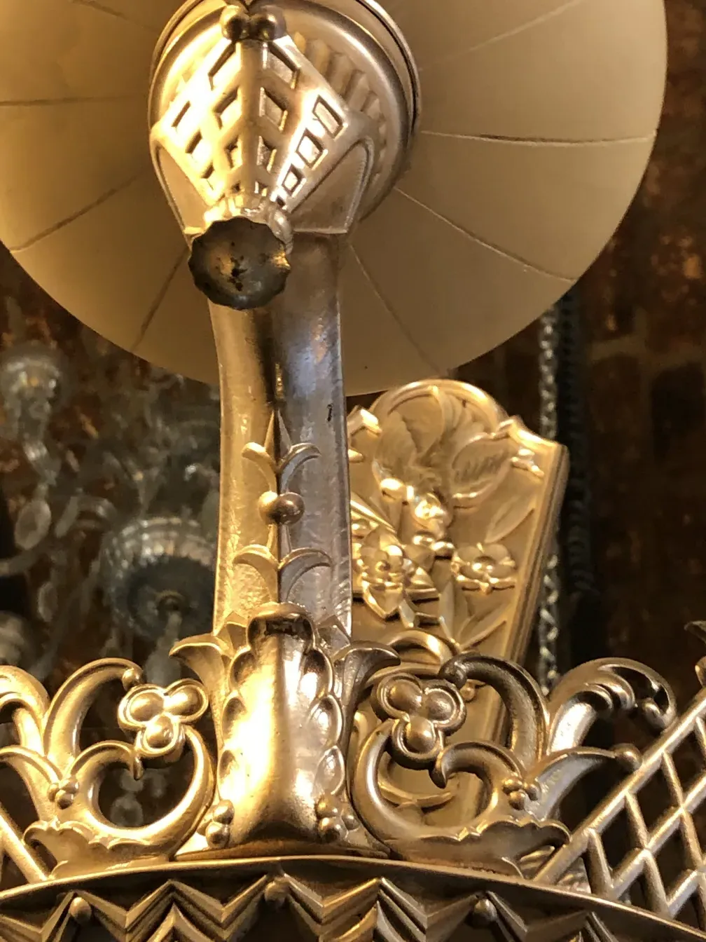 Antique hanging lamp with decorative metal details