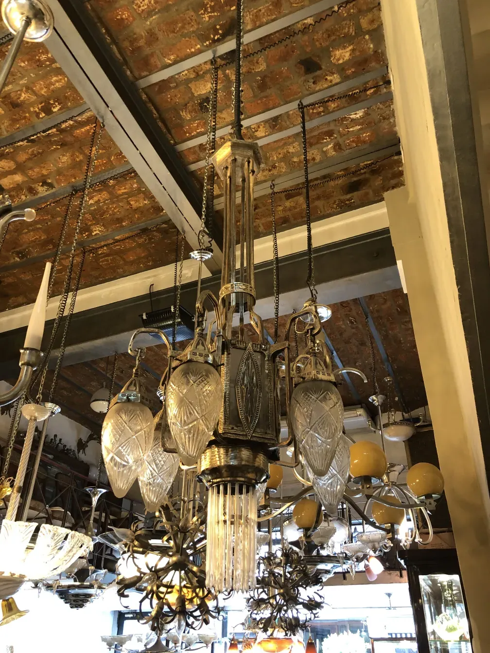 Antique hanging lamp with shiny crystals in a vintage setting