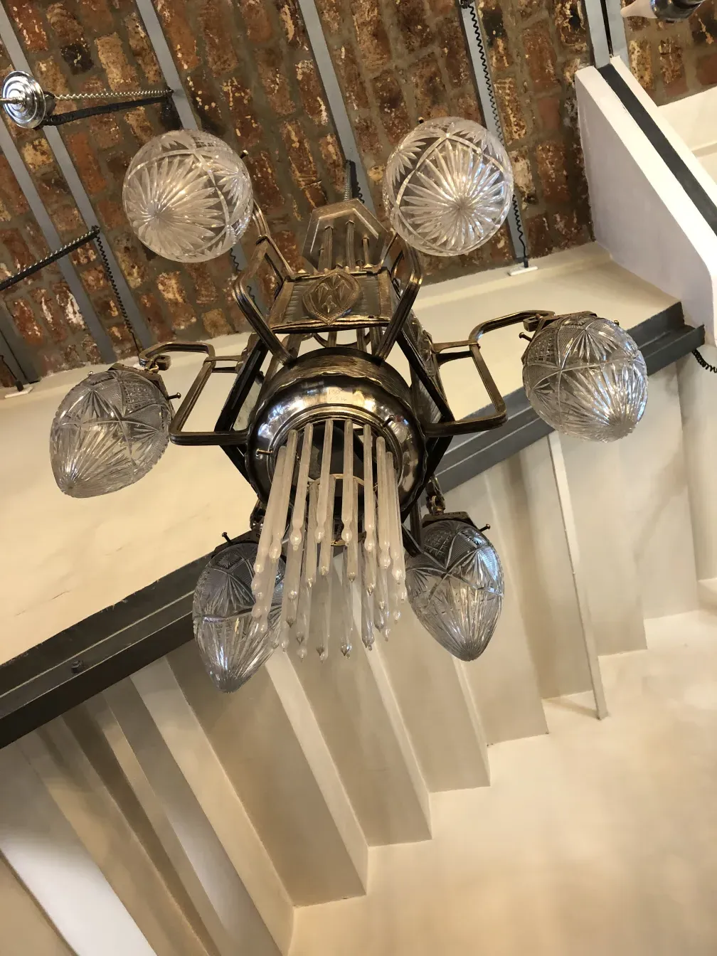 antique hanging lamp with decorative glass and bright lights