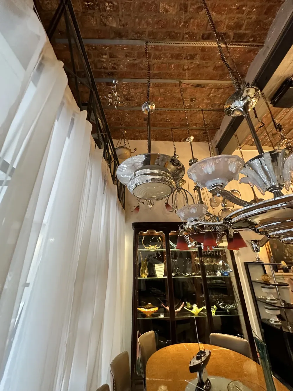 Antique hanging lamp with bright and decorative details.