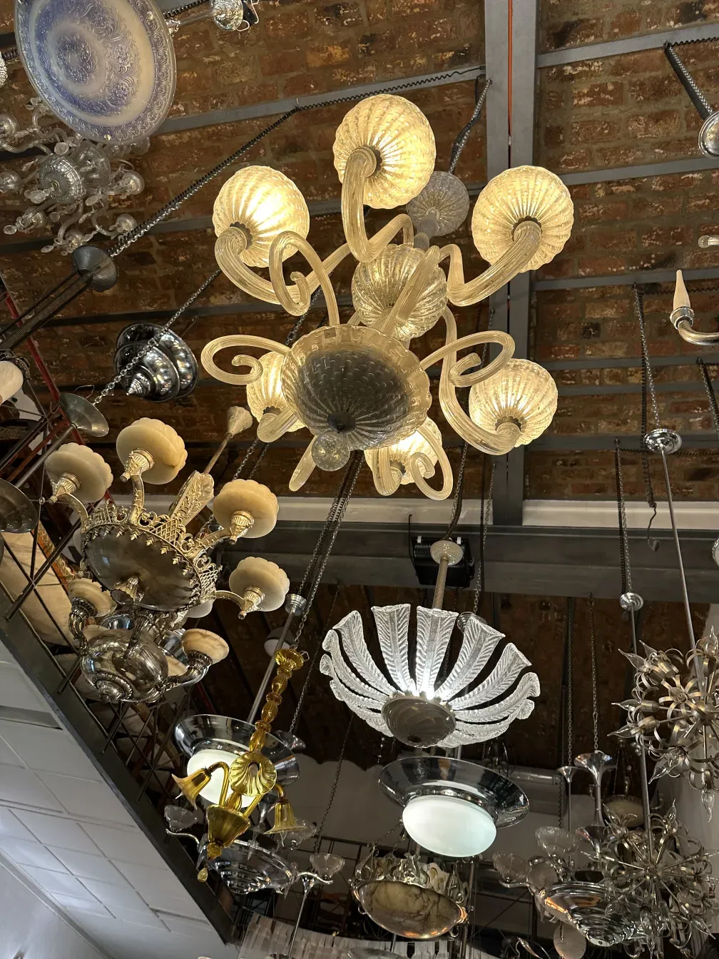 antique hanging lamp with warm light and elegant design, paolo venini