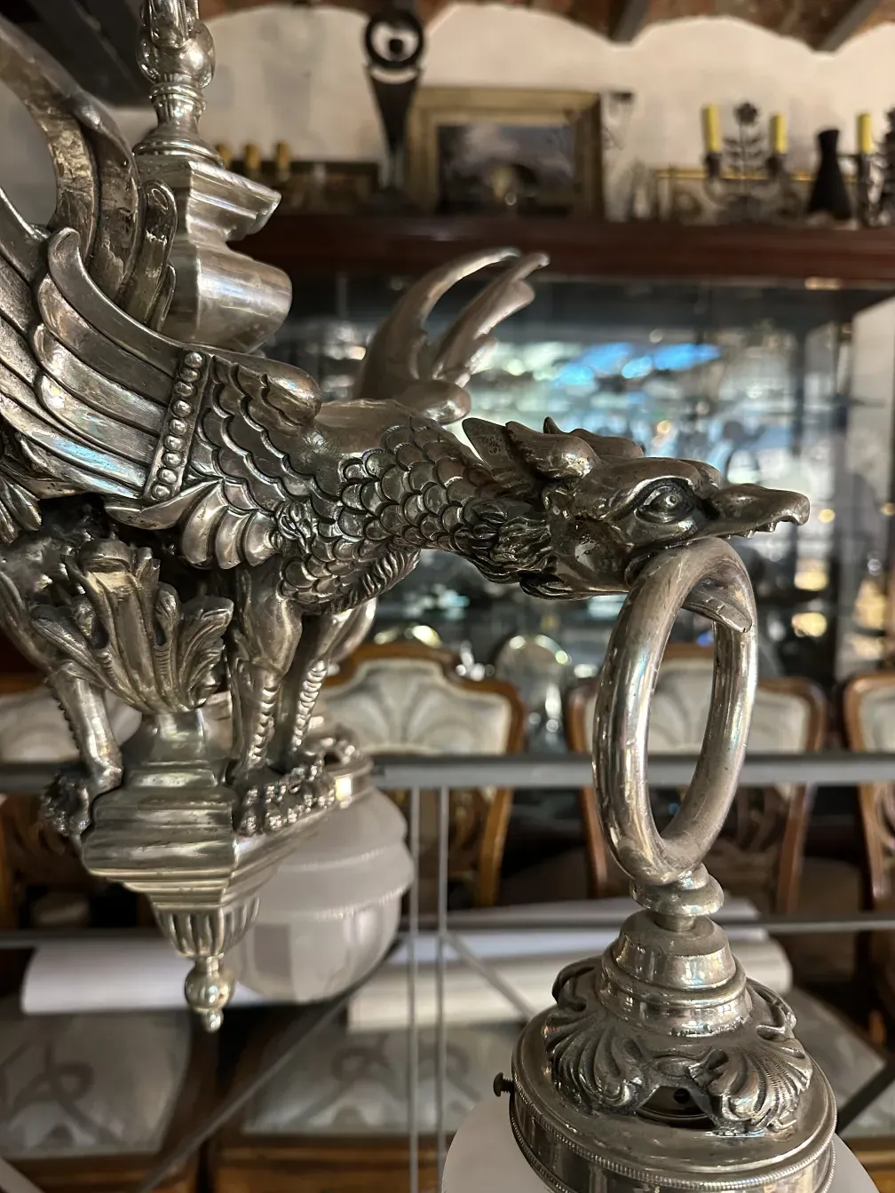 Decorative antique hanging lamp with intricate designs.