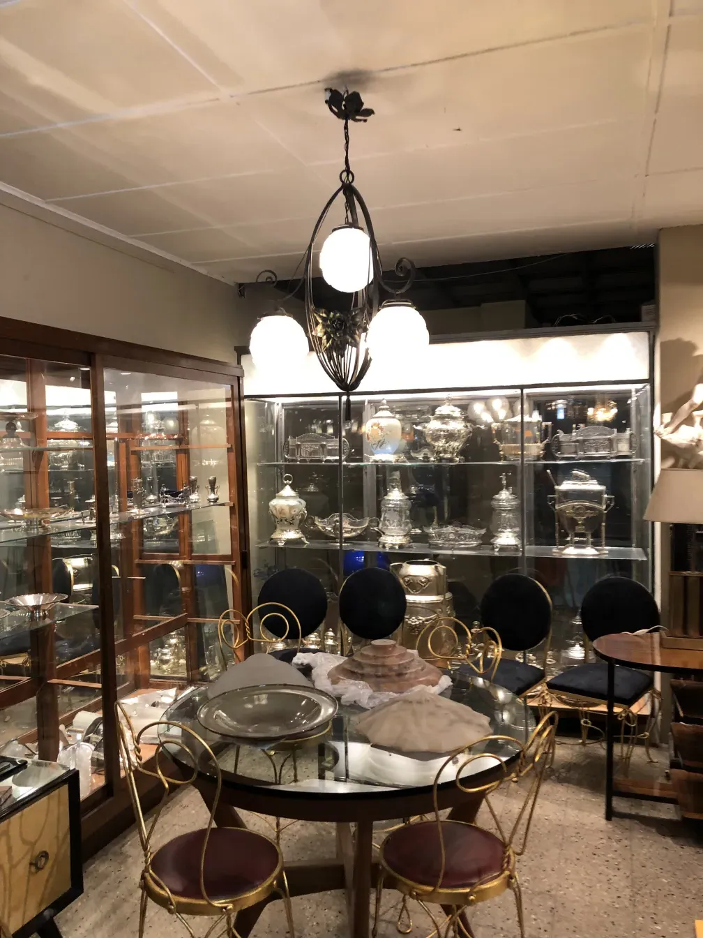 Antique hanging lamp with white spheres, elegant atmosphere