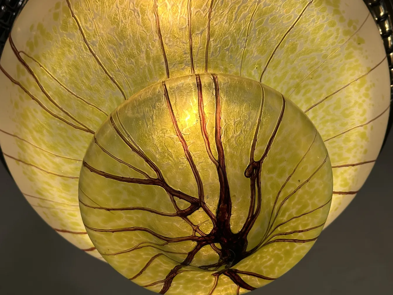 yellow antique hanging lamp with intricate design