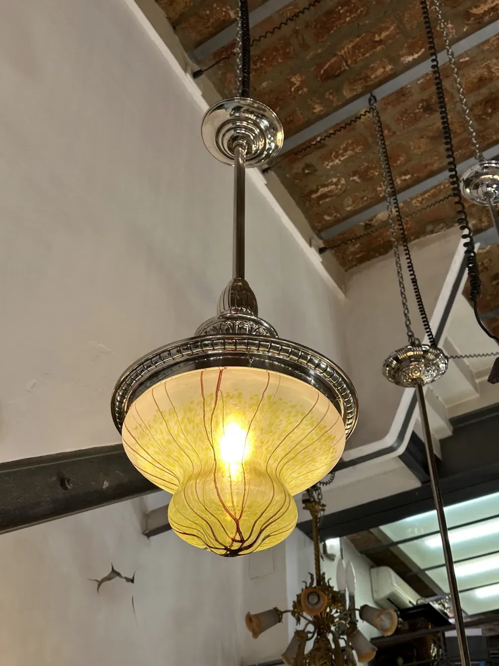 Antique hanging lamp with unique design in a room