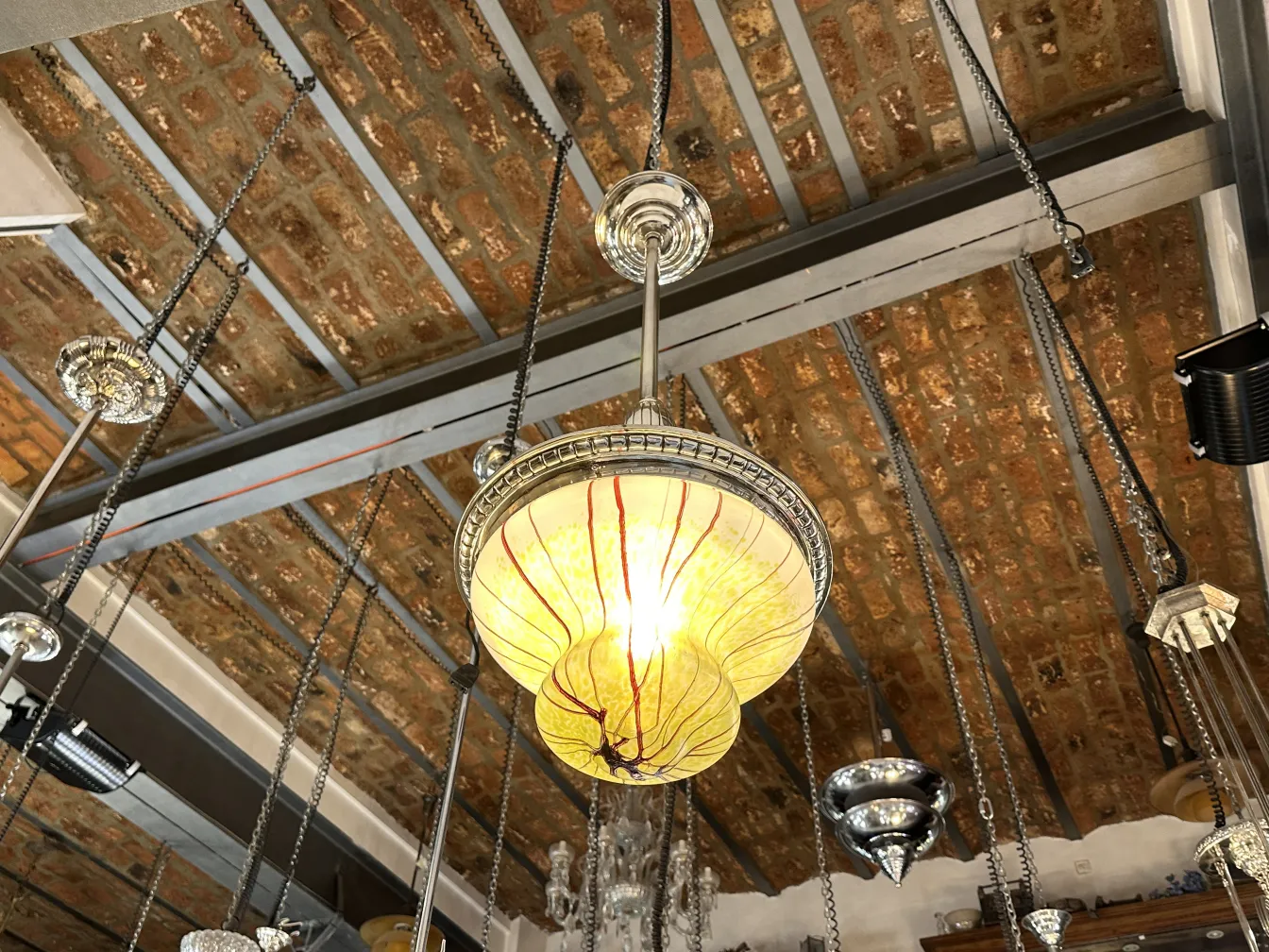 Antique hanging lamp with artistic yellow details and shapes