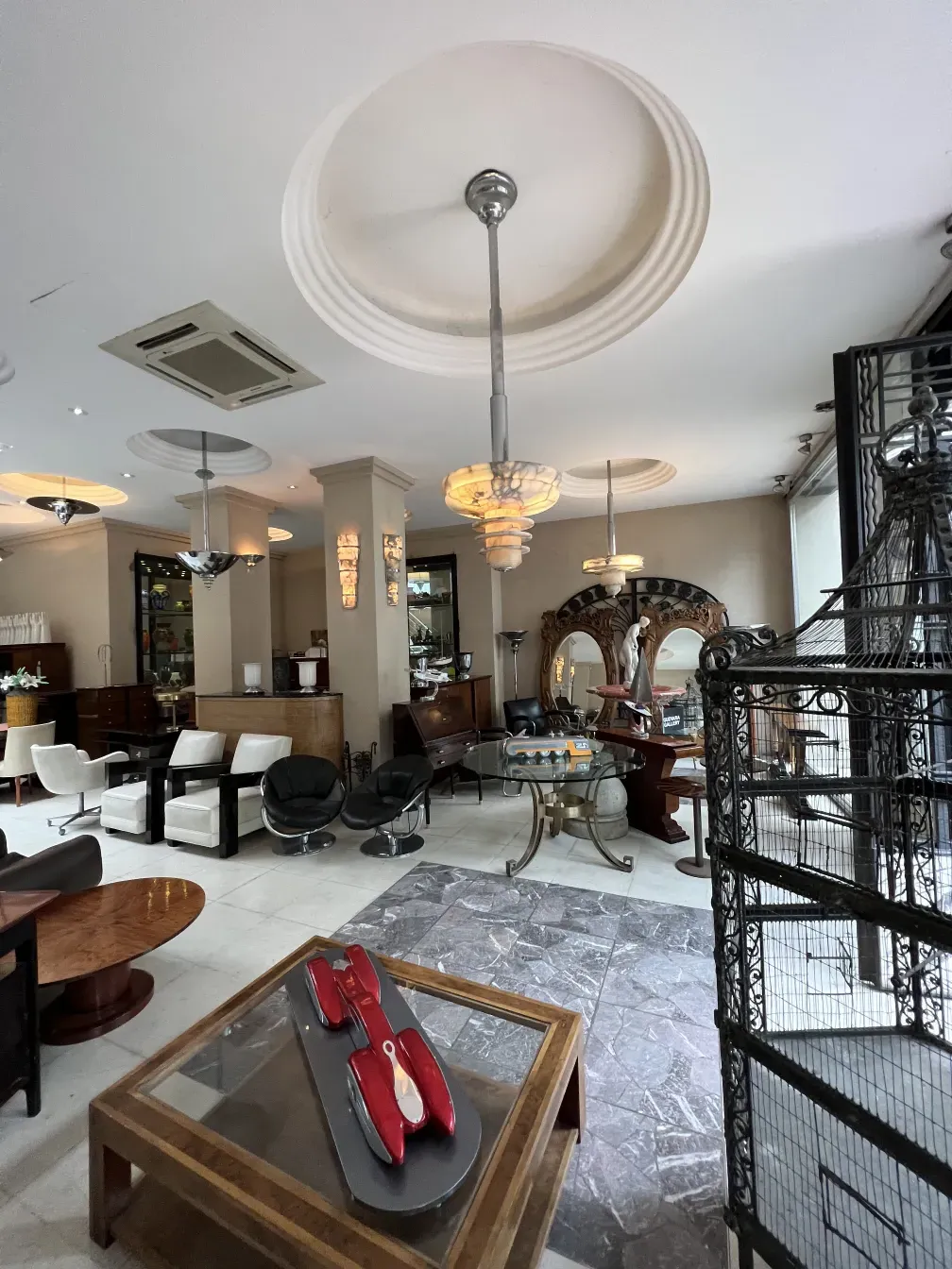 Antique hanging lamp with elegant design in a bright environment with various furniture