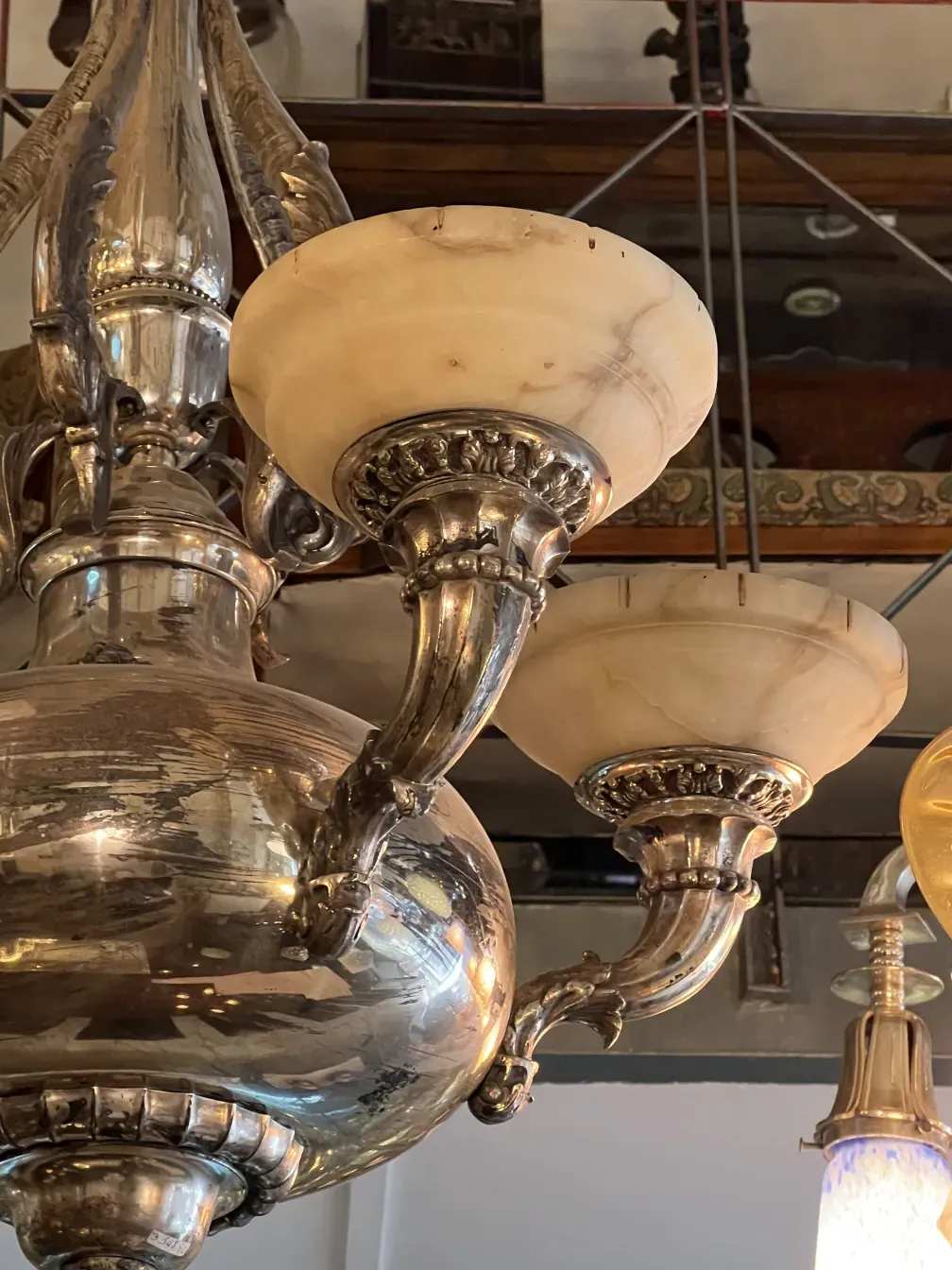 Antique hanging lamp with metal details and warm light