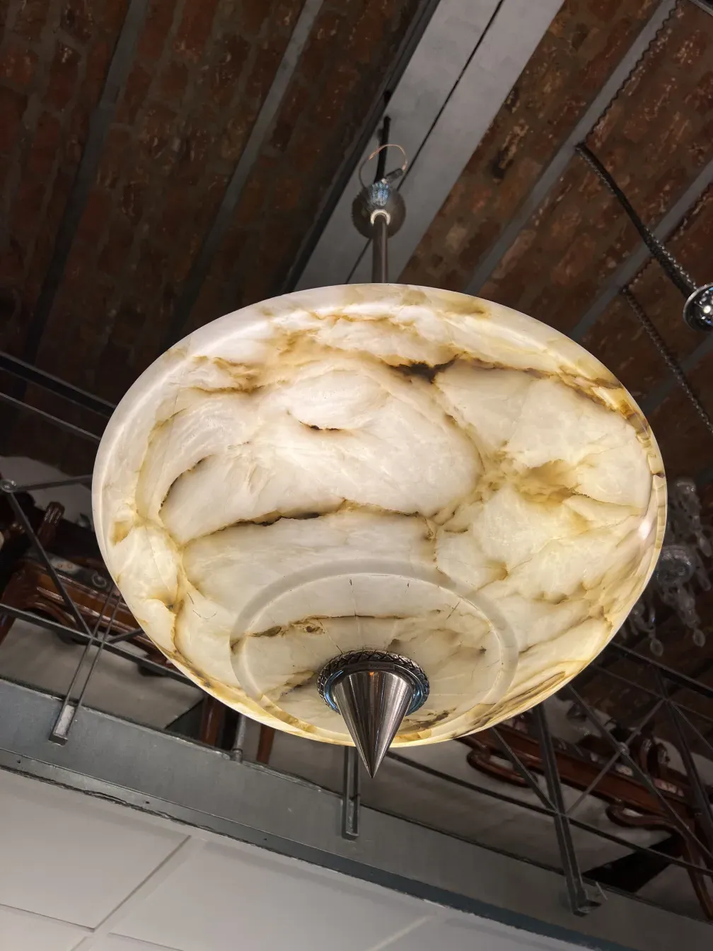 Antique hanging lamp with a unique design in light colors