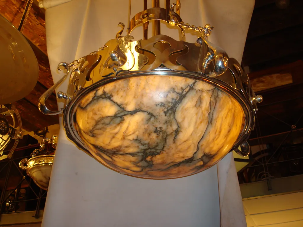 Antique hanging lamp with round base and gold details