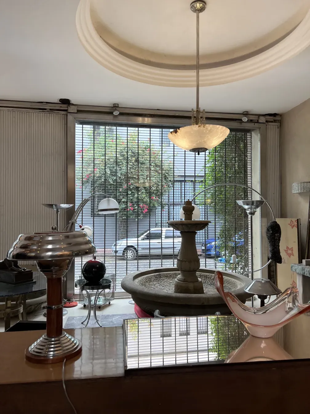 Antique hanging lamp with aesthetic design, bright ambiance.