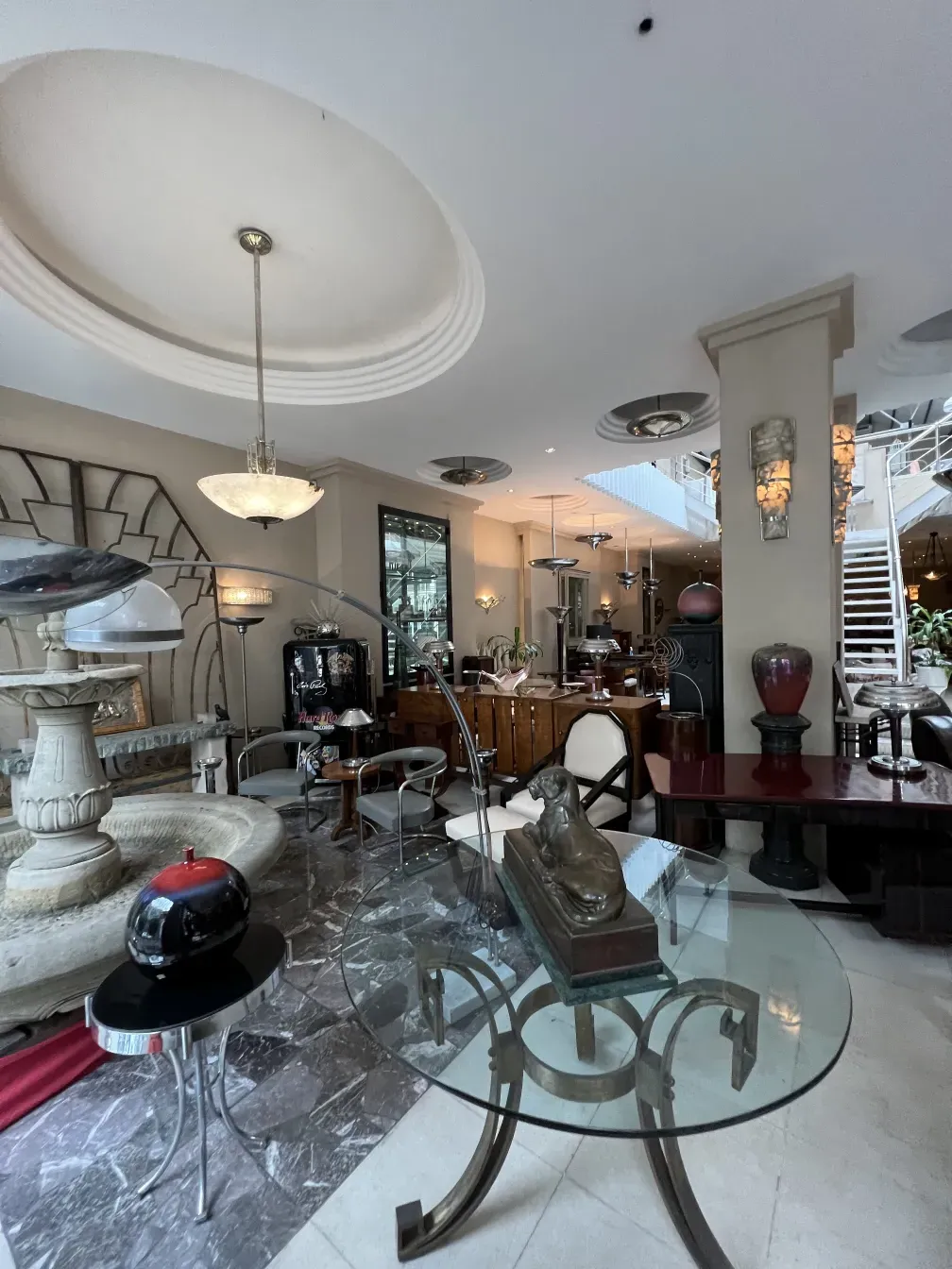 Antique hanging lamp with elegant design in a bright room.