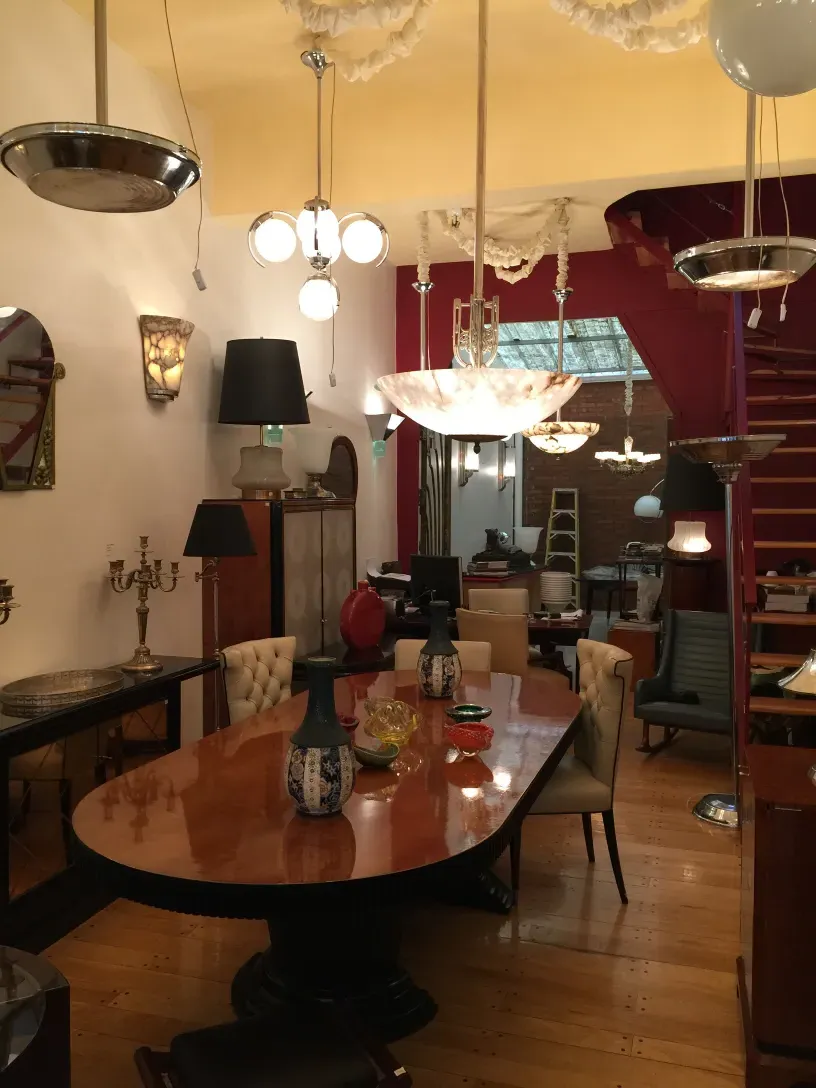 antique hanging lamp with elegant details in a bright dining room