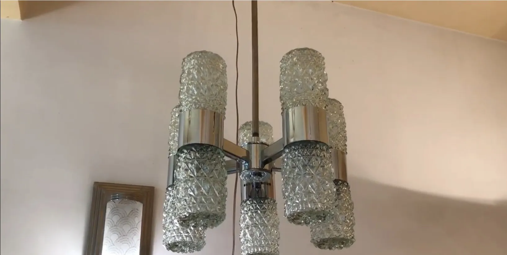 Antique hanging lamp with decorative crystals suspended