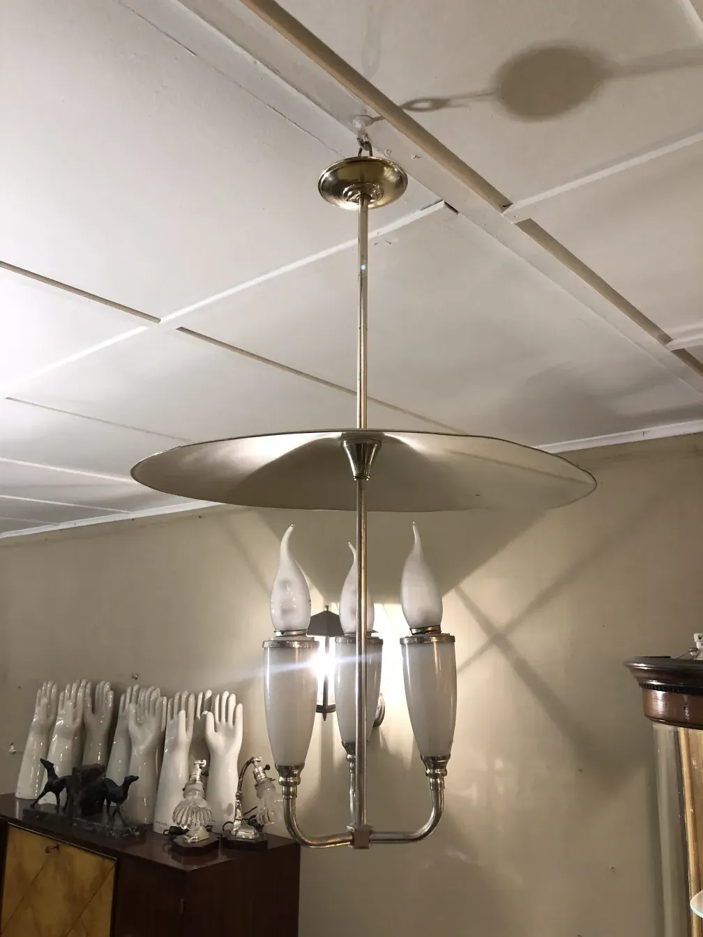 Antique hanging lamp with elegant design and retro look. Mirror style reflects light beautifully.