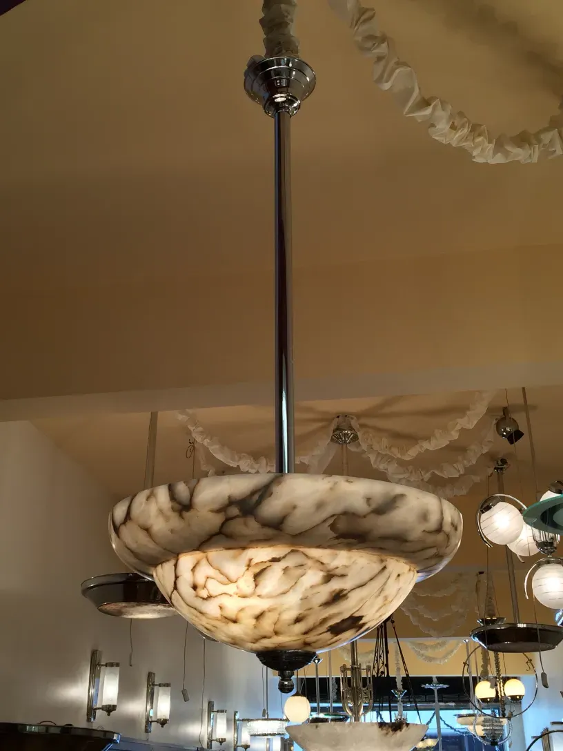 antique alabaster hanging lamp in an elegant setting