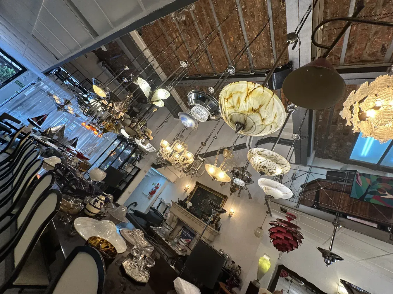 antique hanging lamps with intricate details in a modern setting