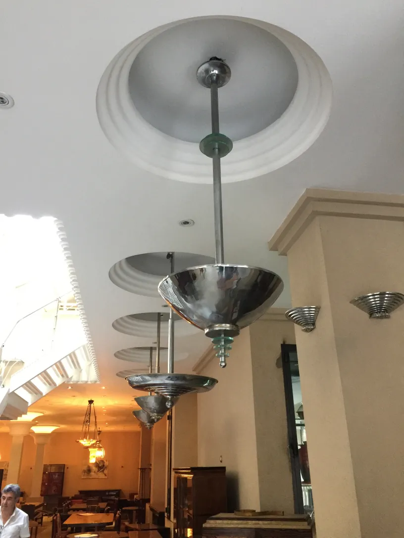 Antique hanging lamp shining in an elegant setting.