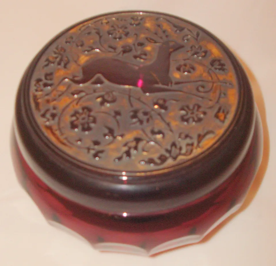 Antique box with decorative lid and engravings