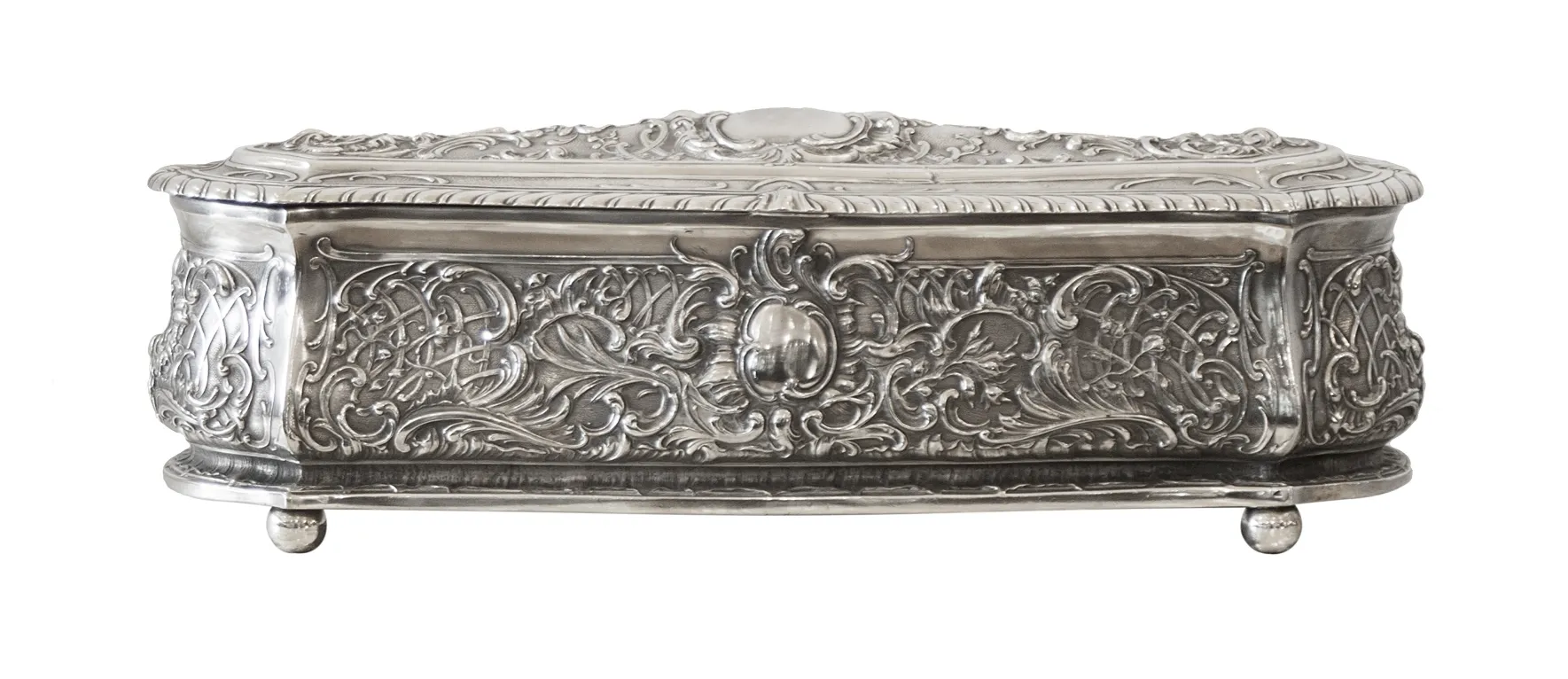 Antique decorative box with intricate silver engravings