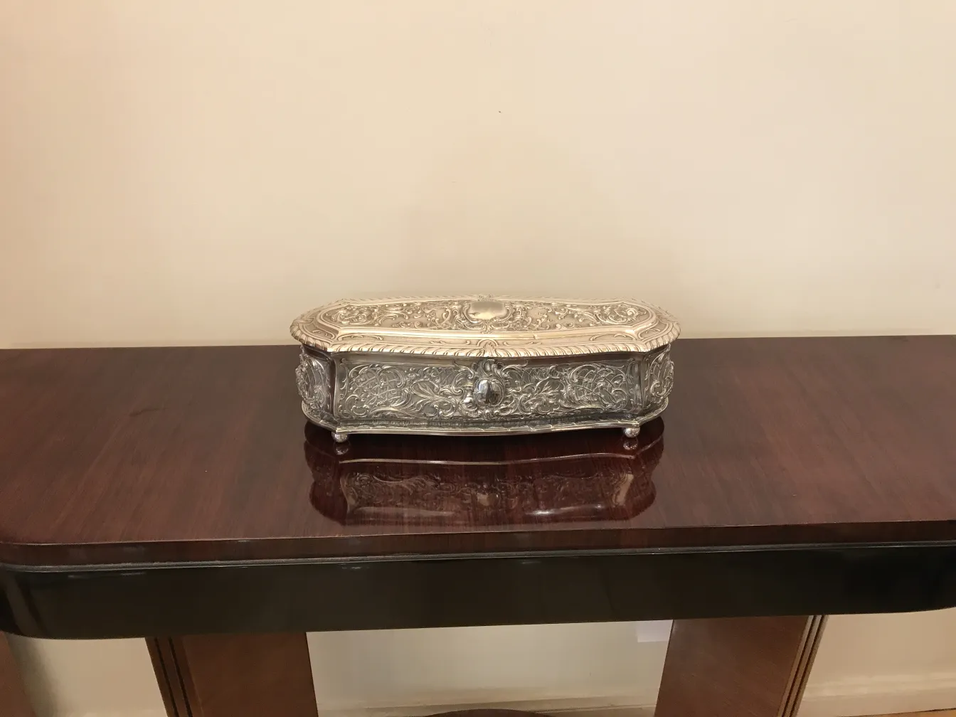 antique decorative box with ornate lid design