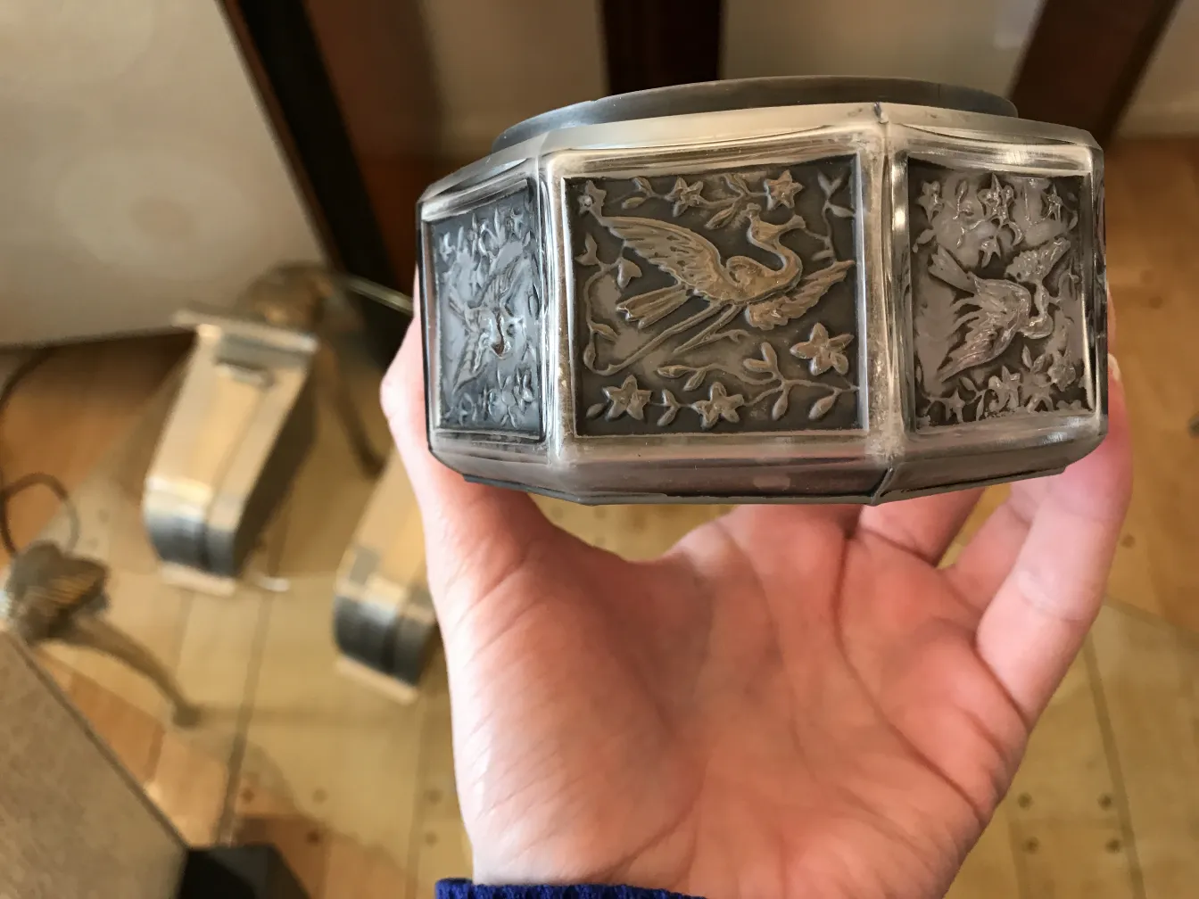 antique box featuring intricate bird designs