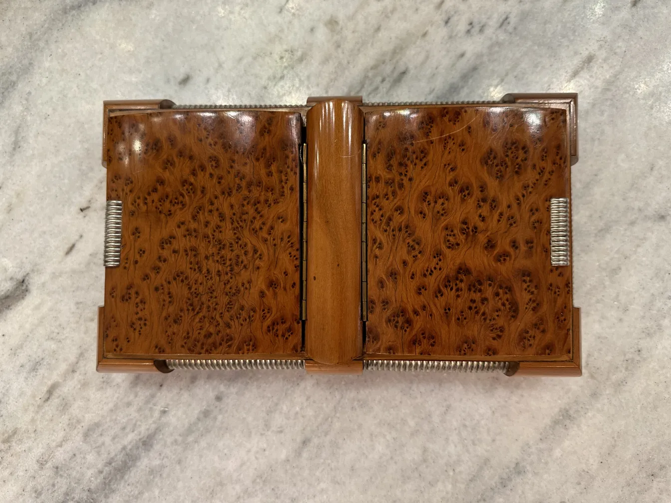 Antique wooden box with decorative design, top view