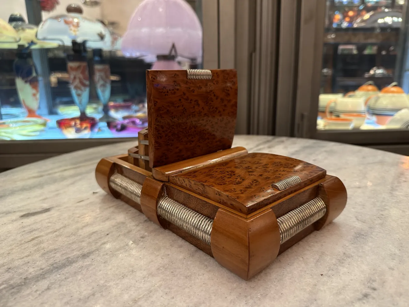 Antique wooden box with metal details, decorative piece.