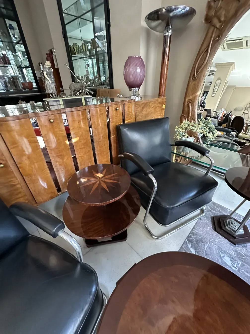 Antique wooden sideboard with elegant details in a room with other furniture