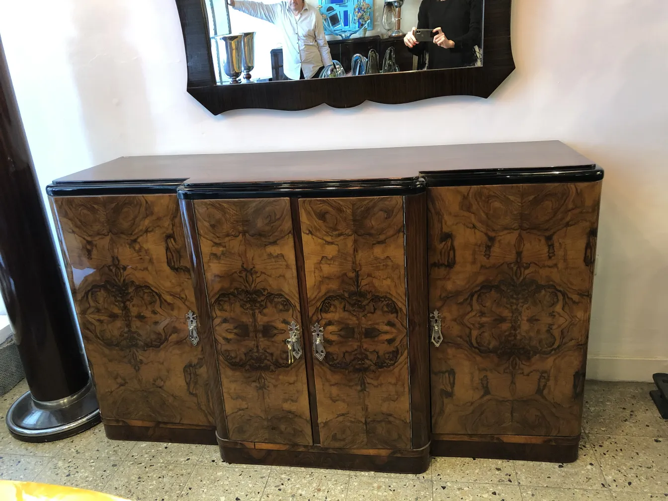 antique sideboard with elegant design and shiny finish in a bright room