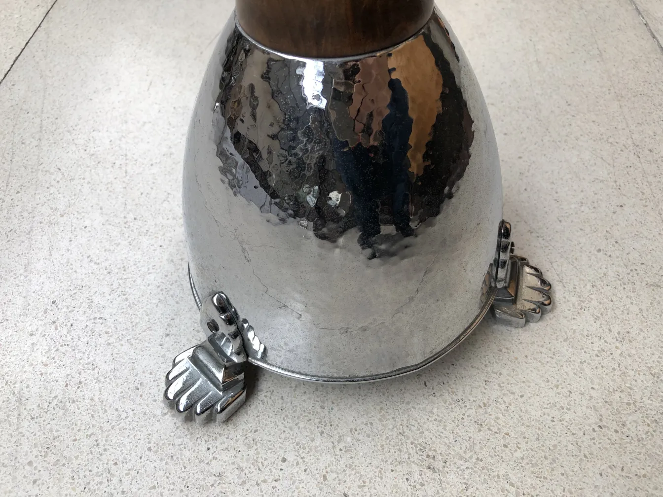 Antique standing ashtray with decorative base design, perfect for classic settings