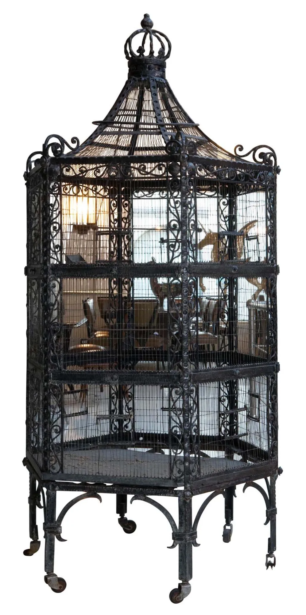 antique cage with decorative details in a cozy setting