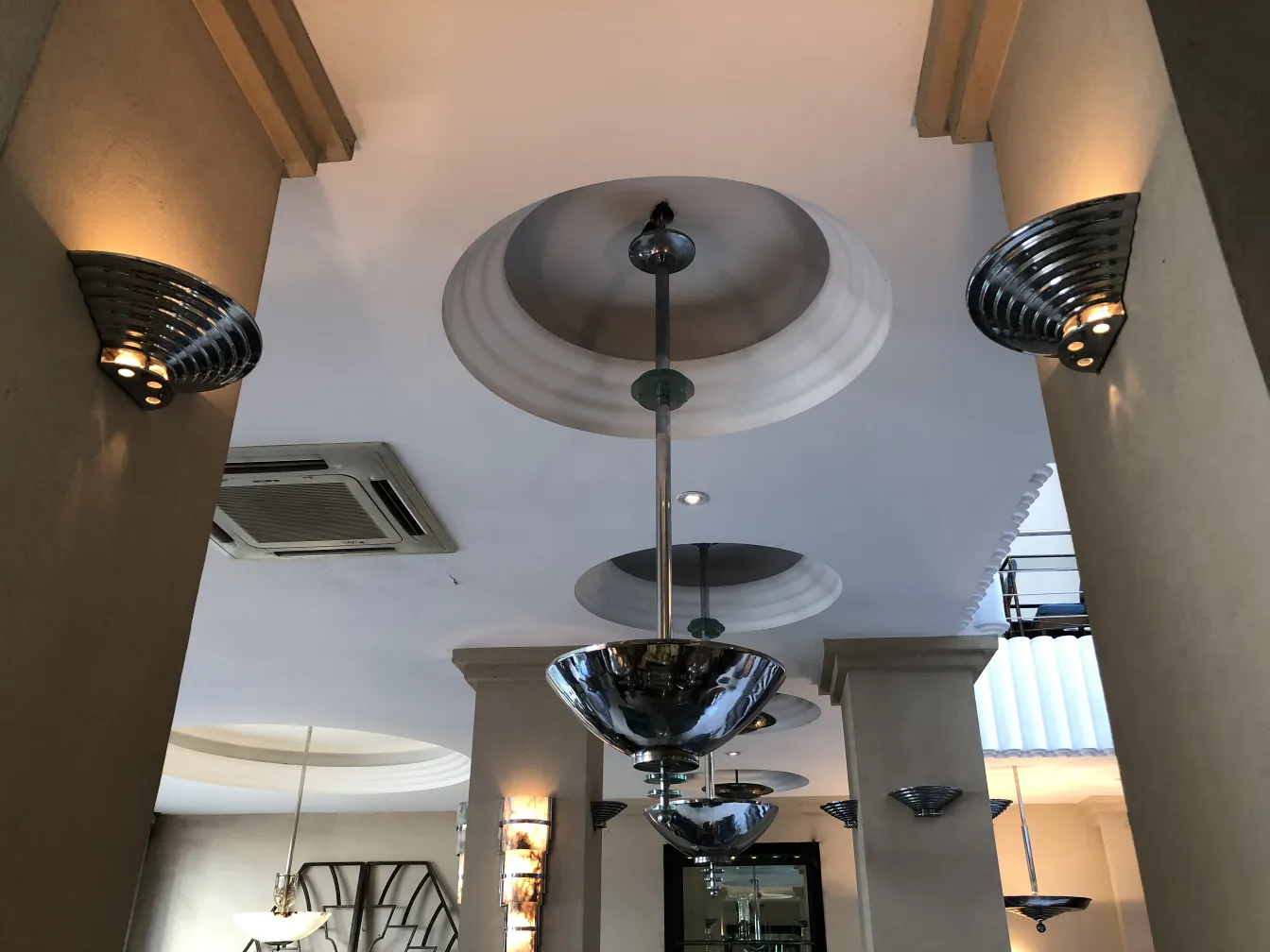 two shiny hanging lamps in an elegant setting