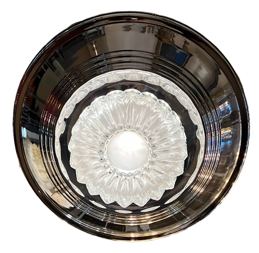 Top view of two antique hanging lamps with decorative base.