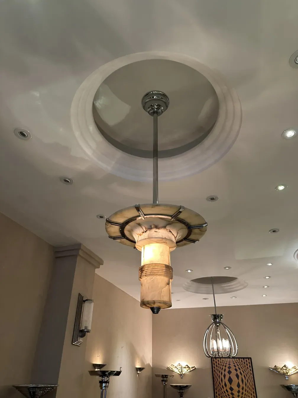 Antique hanging lamps featuring decorative details in a stylish setting.