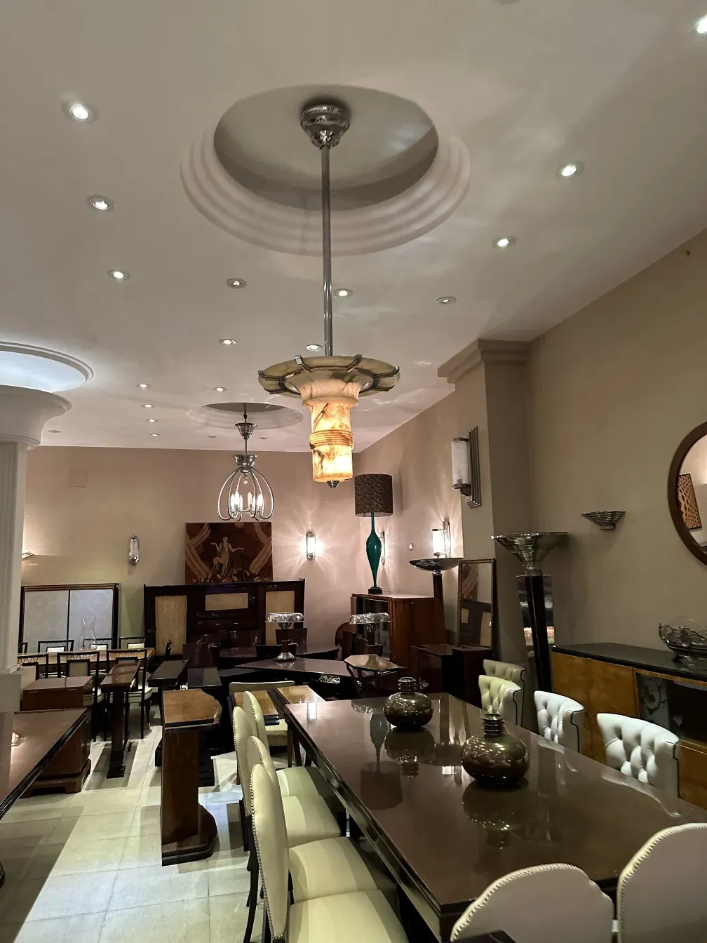 two antique hanging lamps in an elegant setting with decorative details