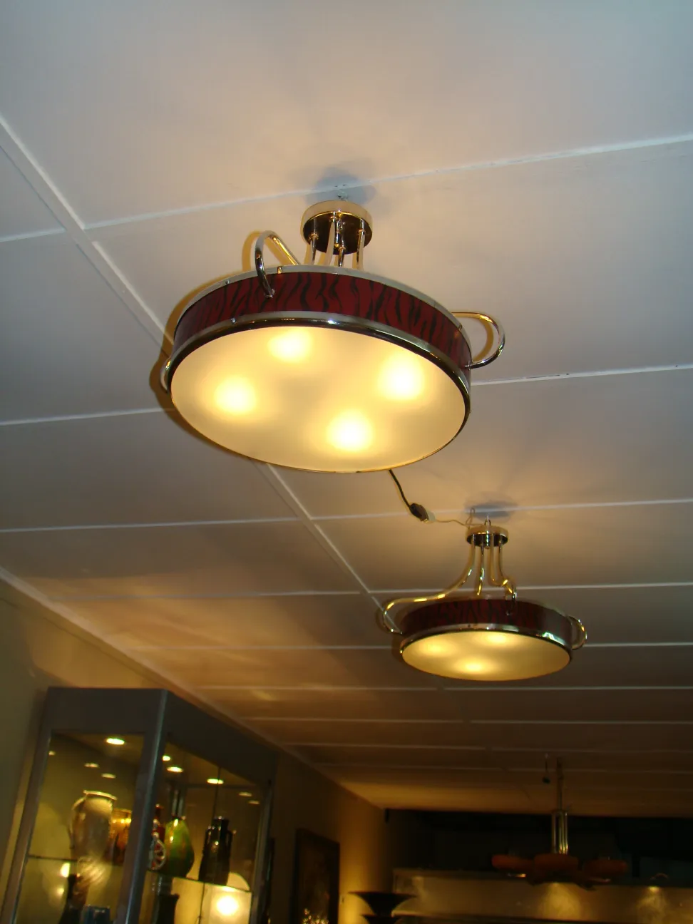 Two antique hanging lamps with style and brightness, illuminating the space.