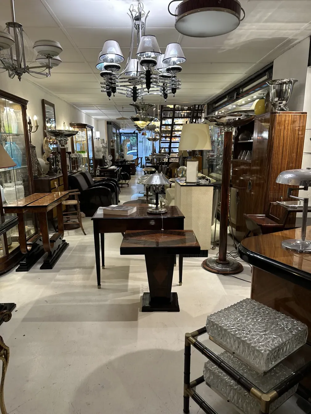 Antique hanging lamp with classic appearance in an elegant and well-lit environment.