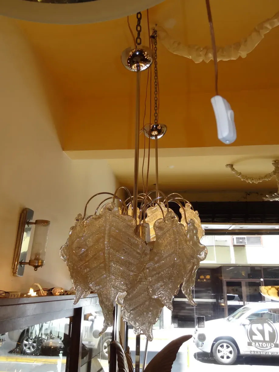 two antique hanging lamps with an elegant design in a cozy setting