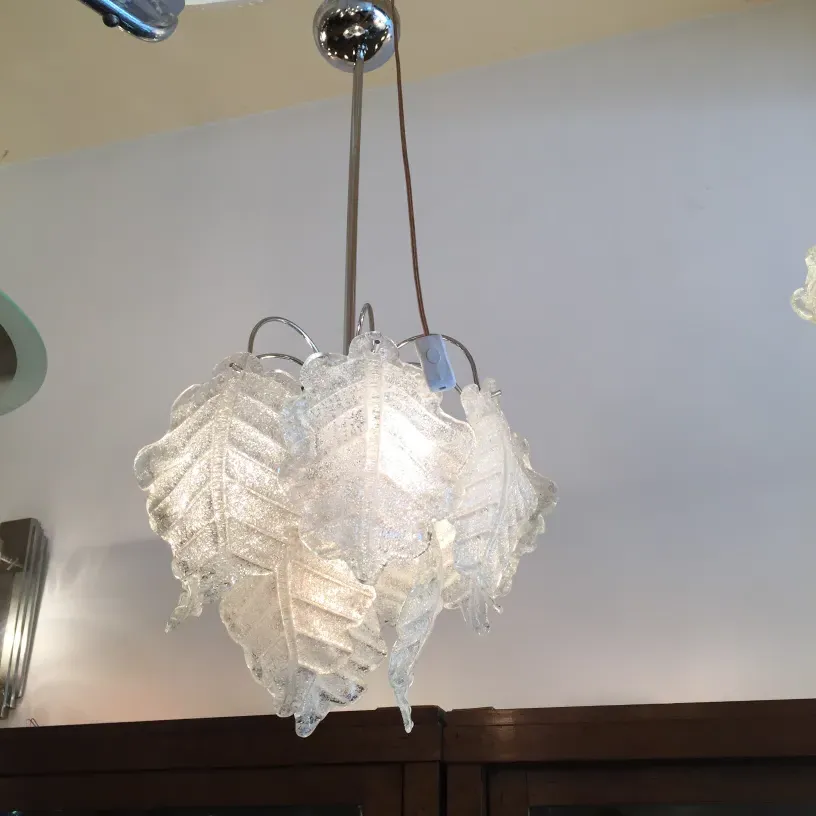 2 antique hanging lamps with elegant design, illuminating a cozy environment