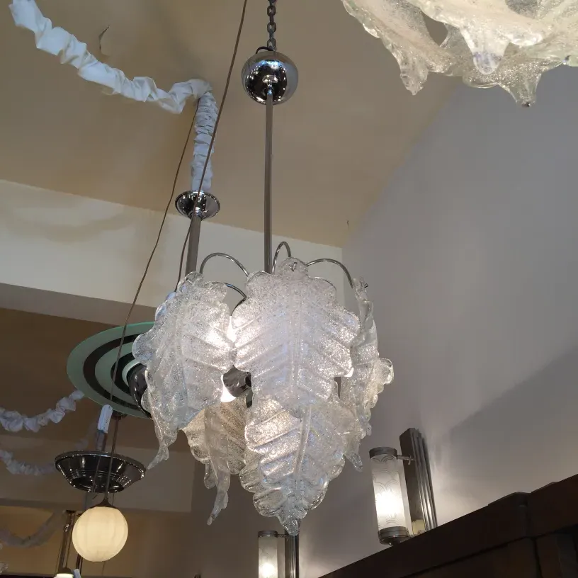 2 antique hanging lamps with leaf design, stylish ambiance