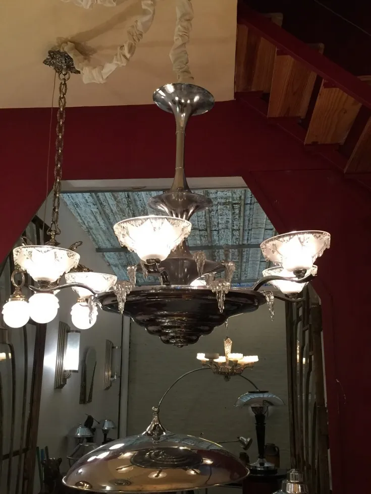 Antique hanging lamp with shiny details in a classic setting.