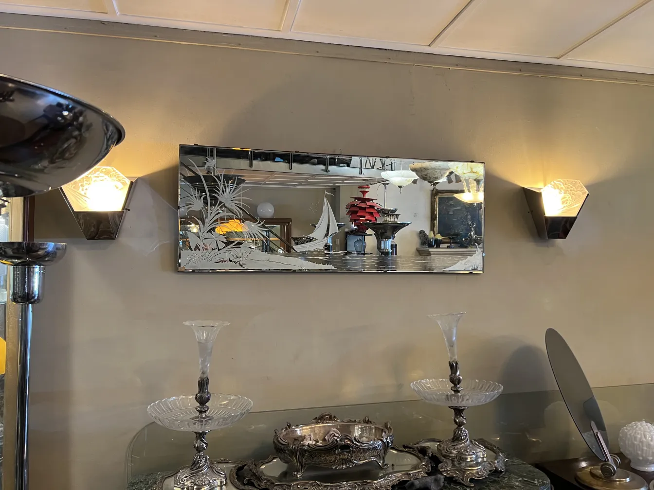 antique mirror decorated, with lights and objects around