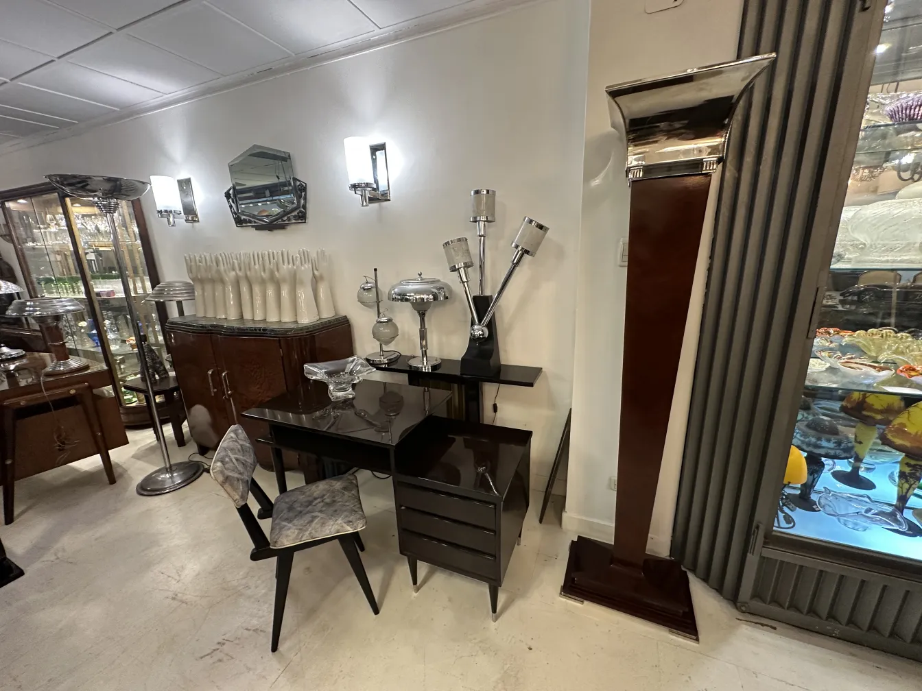 antique mirror featuring decorative shapes and bright accents in an elegant setting