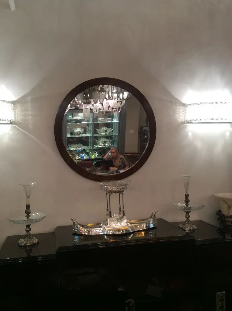 antique round mirror with decorative frame