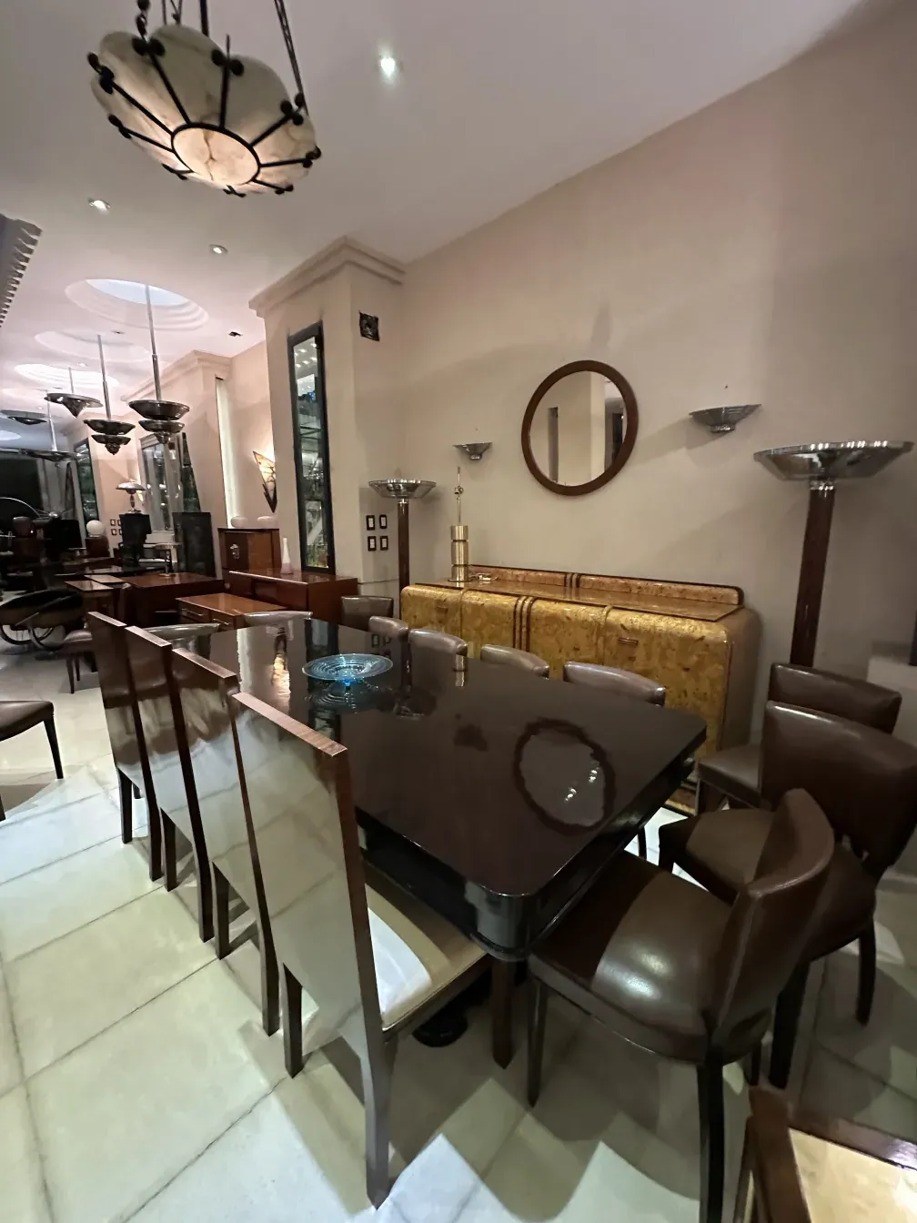 antique mirror with round frame in a modern setting