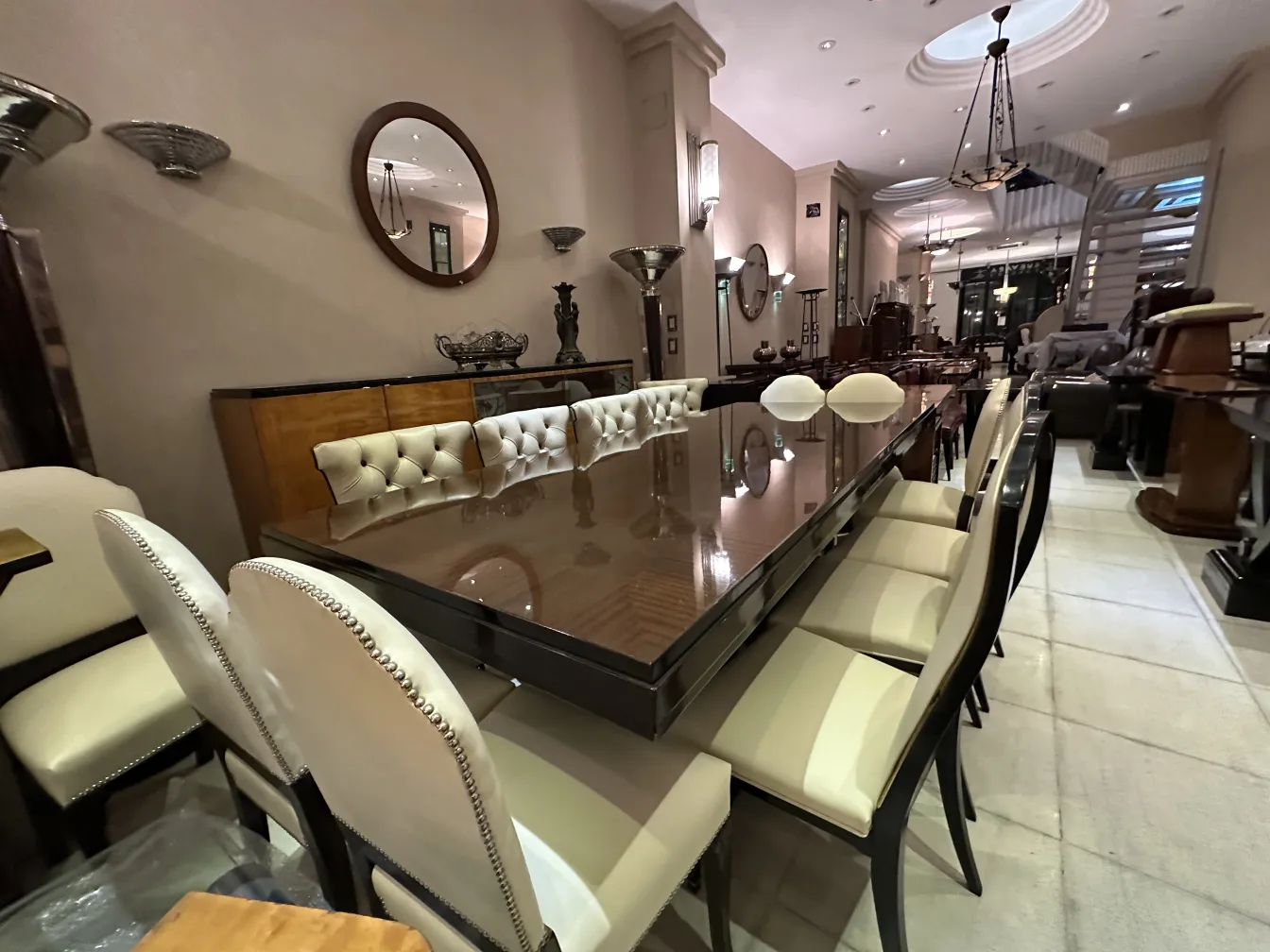 round antique mirror, elegantly framed, in a stylish setting
