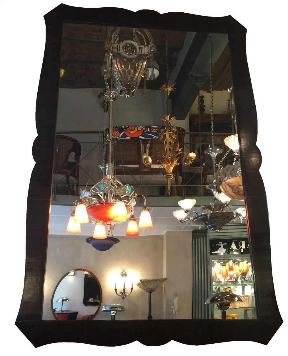 antique mirror with curved frame, decorative background with lights